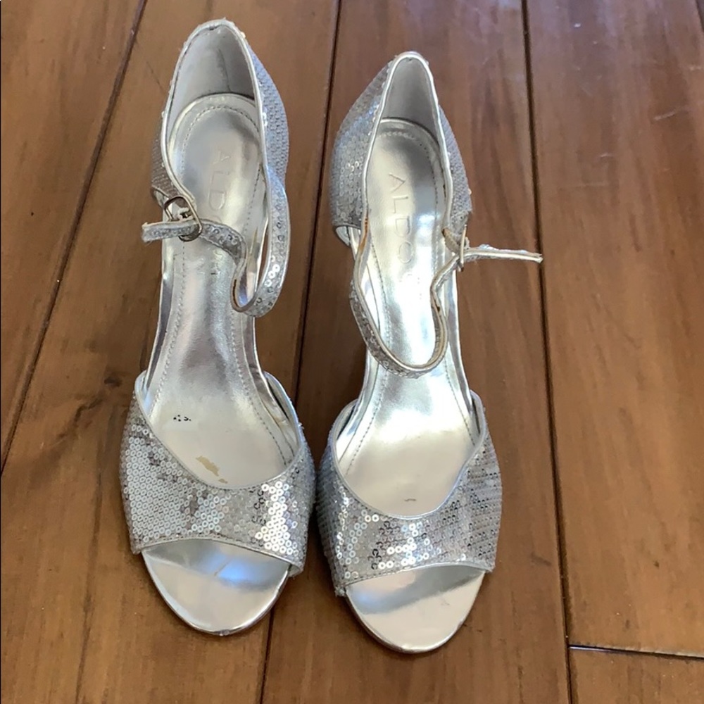 Also Silver glitter heels
